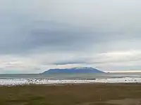 View of snowy Samothrace from a beach in Alexandroupolis