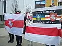 Belarusian opposition supporters holding Vytis (Pahonia) signs during the Protests against the Russian invasion of Ukraine