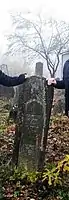 A 19th-century grave monument in the mountainous Kurchali, with Bersa Sheikh's family tree inscribed on the stone.