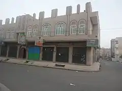 Sanaa Archaeological Library, showing a mix of styles: the windows evoke those of old tower houses, while the materials and structure are essentially modern.