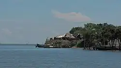 Houses along the edge of a Haor in Itna