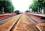 View of the platforms from the buffer stop of the rail tracks.