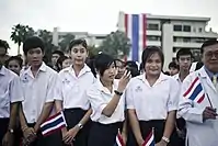 Girls' and boys' school uniform with black skirt and shorts