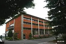 Rectangular red-brick building