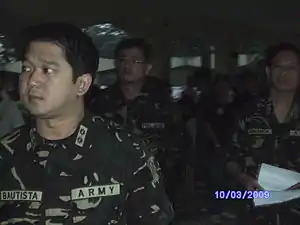 LTC HERBERT M BAUTISTA MNSA (GSC) RES PA together with LTC SAL G DUMABOK MNSA (RES) GSC PA, and then TSg Virgilio S Ferrer II (Res) PA inspect the troops prior to deployment for Rehabilitation Operations on areas affected by TS Ketsana.