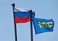 The Russian flag and the flag of the peacekeeping forces.