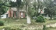 "Cedar Grove" (Amick-Kingsbury House).  The smaller one-story Federal section dating from about 1825 is to the left; the two-story Greek Revivial section dating to 1856 is to the right. Later additions can be seen behind the Federal section.  The house is still used as a residence.