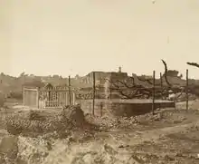 Bibigarh house where British women and children were killed and the well where their bodies were found, 1858.