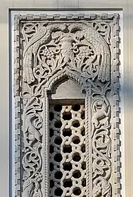 Byzantine Revival window detail of the Laurențiu and Louise Steinebach House with peacocks drinking from a cup, by Alfred Popper, 1915-1916