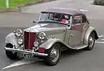 MG TD circa 1953, with manual soft top and detachable side screens with plastic windows