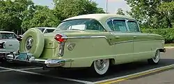 1956 Nash four-door sedan with factory color matched Continental tire with shell cover