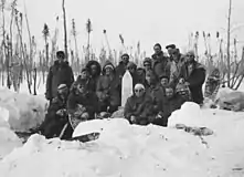 Survey crew photographed after the installation of obelisk on April 6, 1962