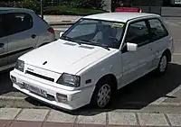 A 1988 Suzuki Swift GTi showing model specific fog lights