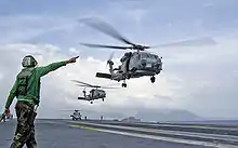 HSL-47 launches off USS Abraham Lincoln to provide disaster relief in Sumatra