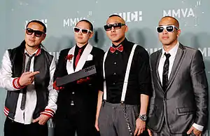 Far East Movement posing for photographers