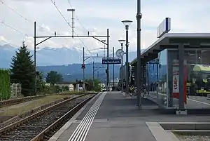 Double-tracked railway line with side platforms