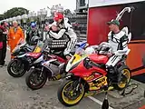 Winners Presentation 2012 Senior Manx Grand Prix – Andrew Soar (43) 750 cc Suzuki, John Simpson (31) 675 cc Triumph & Wayne Kirwan (4) 600 cc Yamaha TT Grandstand Friday 31 August 2012