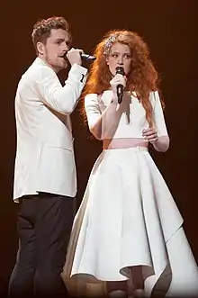 Mørland and Debrah Scarlett performing "A Monster Like Me" in Vienna (2015)