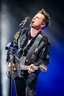 Bellamy performing with Muse in June 2018