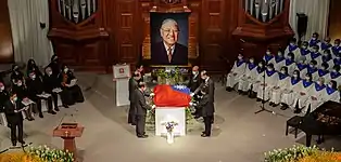 Draping of the national flag on the casket