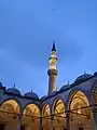 Süleymaniye Mosque portico and one of the minarets at night