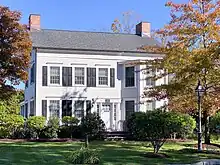 Two-story white building at 24 Bedford Road