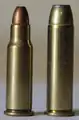 .256 Winchester Magnum round next to its parent case, the .357 Magnum.