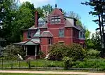 275 Elm Street, Northampton, MA.  Queen Anne style rendered in red brick.