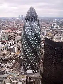 30 St Mary Axe, one of London's most popular new buildings, towers above its neighbours.