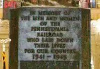 Inscription on the front of the monument; another is on the back.