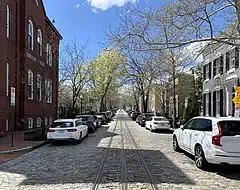 View of P Street NW in Georgetown, which features streetcar tracks installed by the Metropolitan Railroad in the 1890s