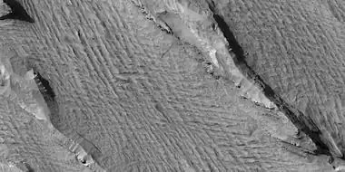 Yardangs, as seen by HiRISE under HiWish program Location is near Gordii Dorsum in the Amazonis quadrangle. Note: this is an enlargement of previous image.