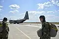 Romanian paratroopers prepare to board a C-130J Super Hercules during Carpathian Fall 2017 exercise.