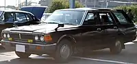 Nissan Cedric Wagon (430). Lower specification model with twin headlights.