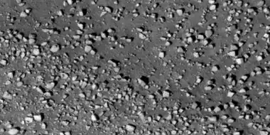 Close view of boulders along crater rim Boulders are roughly the size of cars or small houses.  Picture taken with HiRISE under HiWish program.