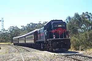 A heritage train stops at Summit Tank platform