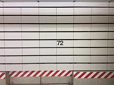 The trackside tiles at the 72nd Street station