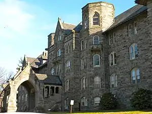 Stone facade and entryway of a multistory building