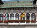 Coats of arms of the Sette Comuni on the municipal hall of Sleghe.