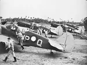 No. 86 Squadron RAAF about to take off in their Kittyhawk fighters at Merauke in April 1944