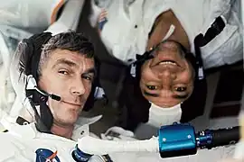 Plantronics (SPENCOM) headsets in use by NASA Astronauts Evans and Cernan, both wearing "Snoopy" caps, aboard the Apollo 17 spacecraft