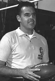 Otto Graham holding a football