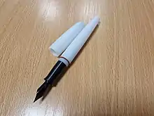 A fountain pen with a polyoxymethylene body and cap