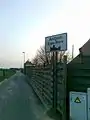 Town sign: the speed limit of 50 km/h in Aaigem