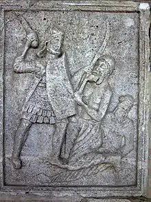 Tropaeum Traiani depicting a falx/romphaia in battle