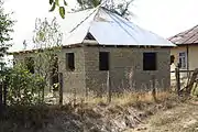 Adobe brick house under construction in Romania