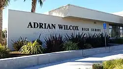 The side wall of the Wilcox office, as seen from the main parking lot