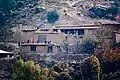 A mud brick house on a mountainside - a common sight in the hilly areas of the Afghan countryside