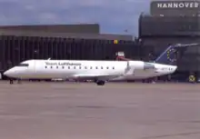 An Air Littoral or Lufthansa,CRJ-100 in Team Lufthansa colours. This photo was taken in Hanover, Germany. Air Littoral was a French airline. The CRJ-100 was made by Bombardier/Canadair (both Canadian manufacturers). The aircraft is registered F-GPTF. This photo was first released to the public in 1999. It was taken in a unknown year (probably in 1999).This photo is about 5.9x4.1 (150x105 mm).