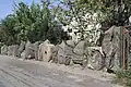 Stone wall near a house